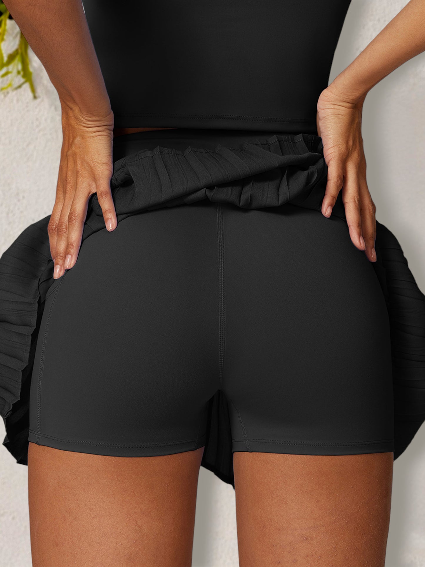 Falda pantalón deportiva plisada de cintura alta para mujer con pantalones cortos incorporados