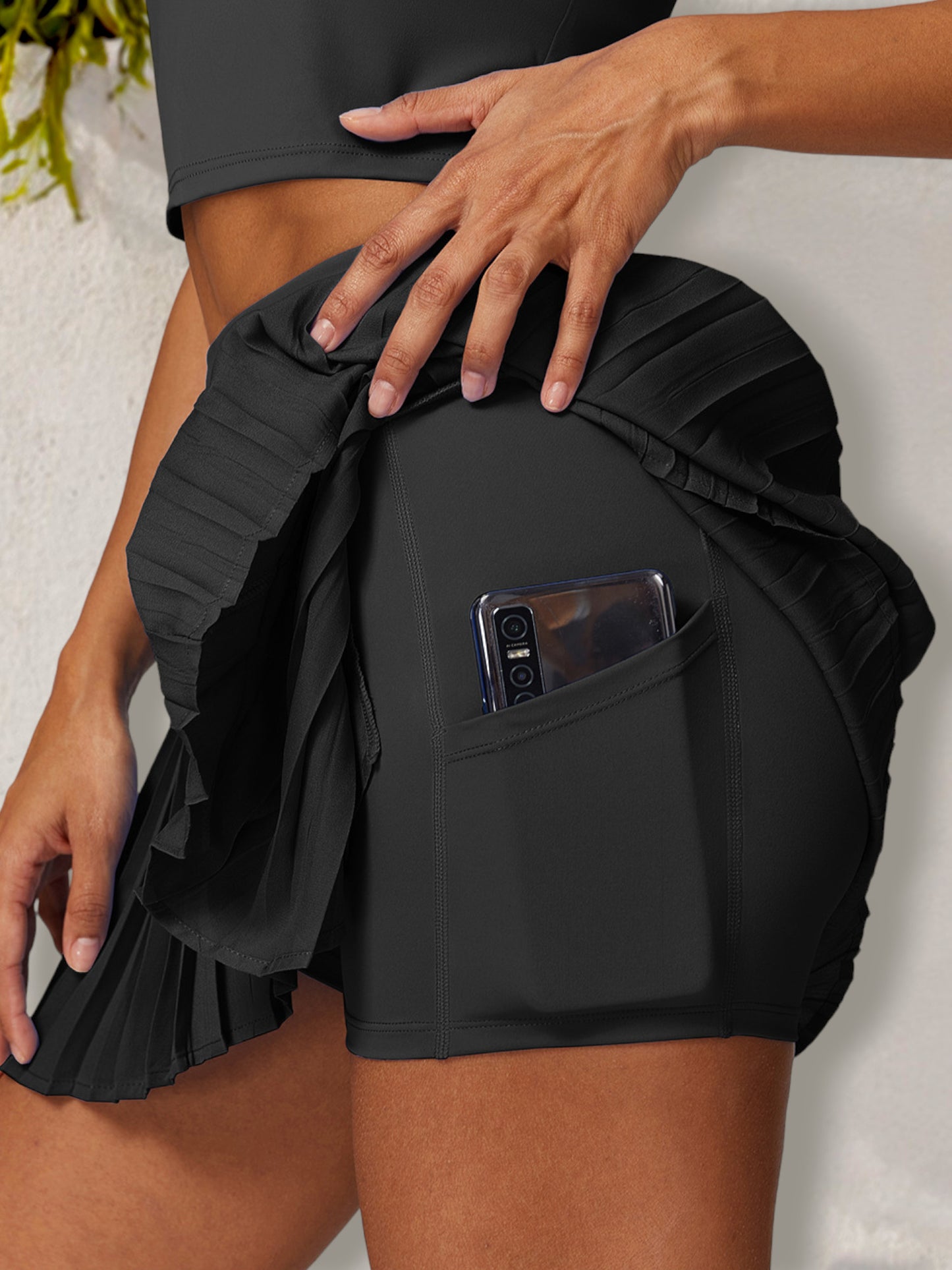 Falda pantalón deportiva plisada de cintura alta para mujer con pantalones cortos incorporados