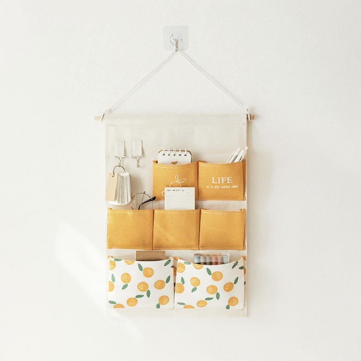 Anna-Kaci Hanging Wall Storage Organizer with Multiple Fabric Pockets and Orange Fruit Print Design