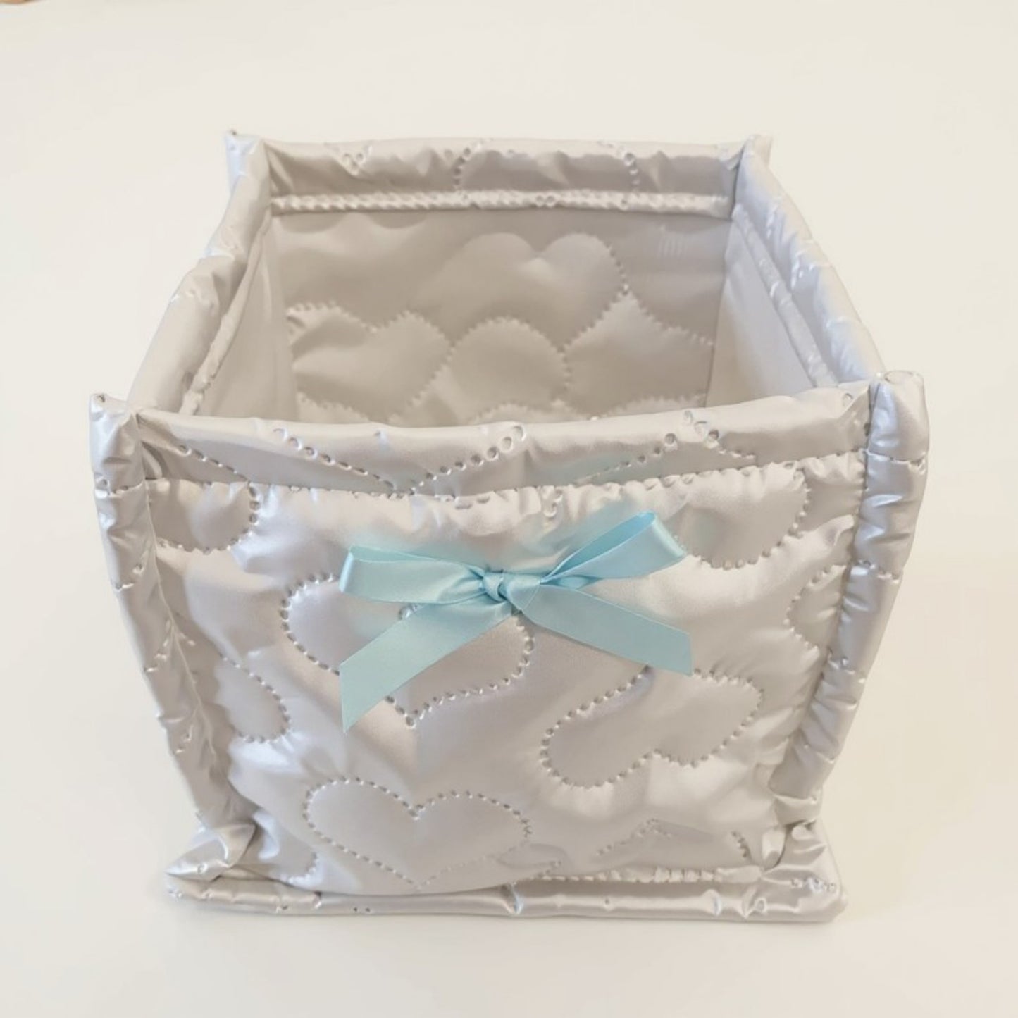 Anna-Kaci Quilted Storage Basket with Heart Stitching and Bow Accent