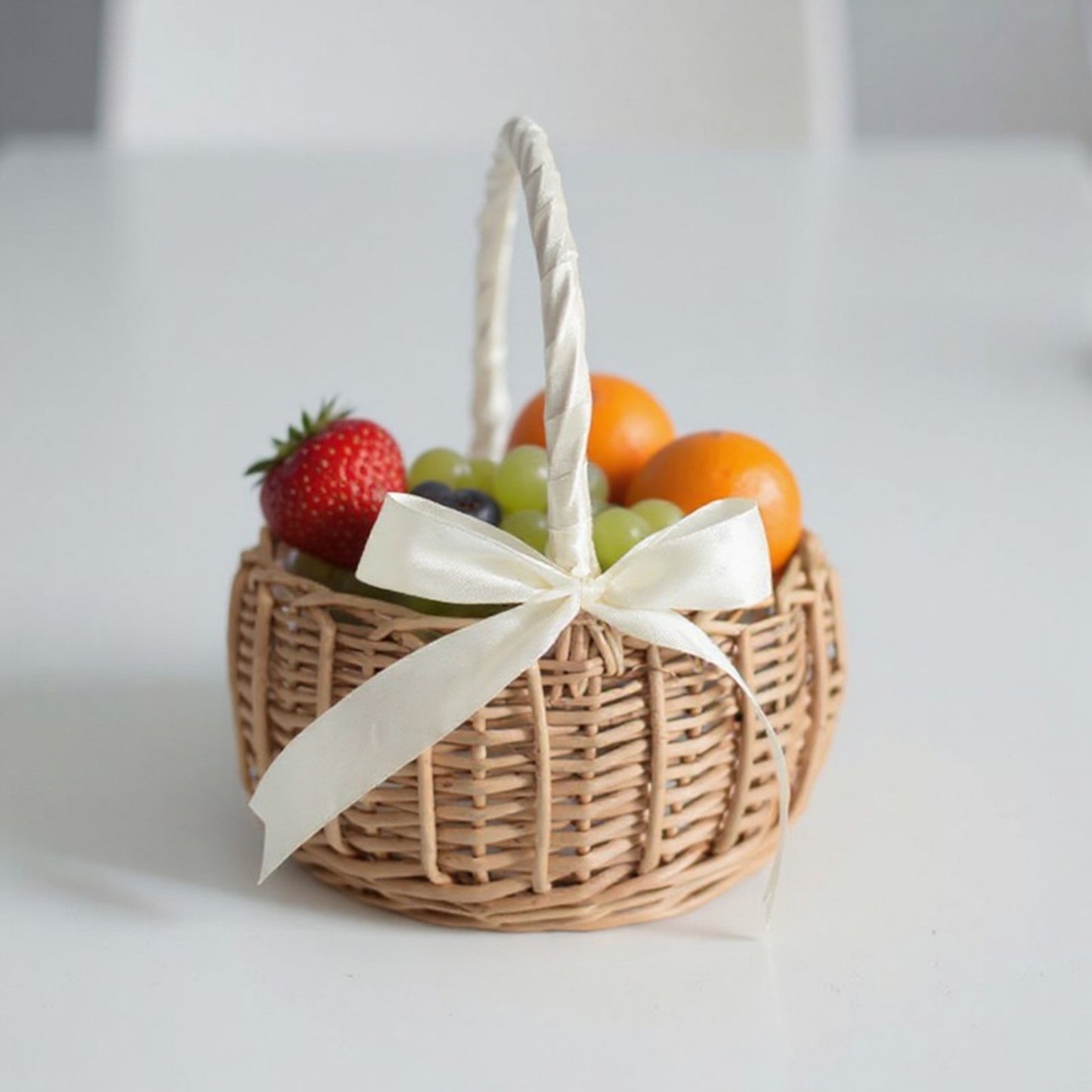 Anna-Kaci Round Woven Basket with Handle and Decorative Ribbon Accent