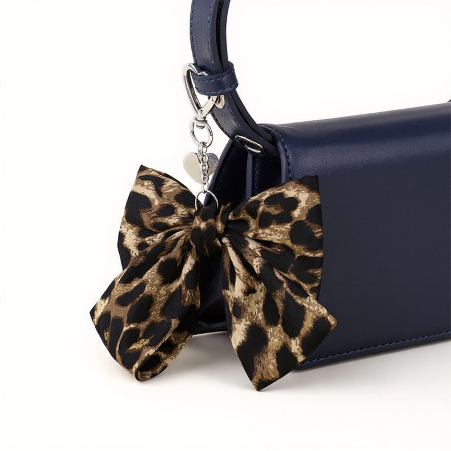 Anna-Kaci Leopard Print Fabric Bow Keychain with Silver Heart Clip Charm