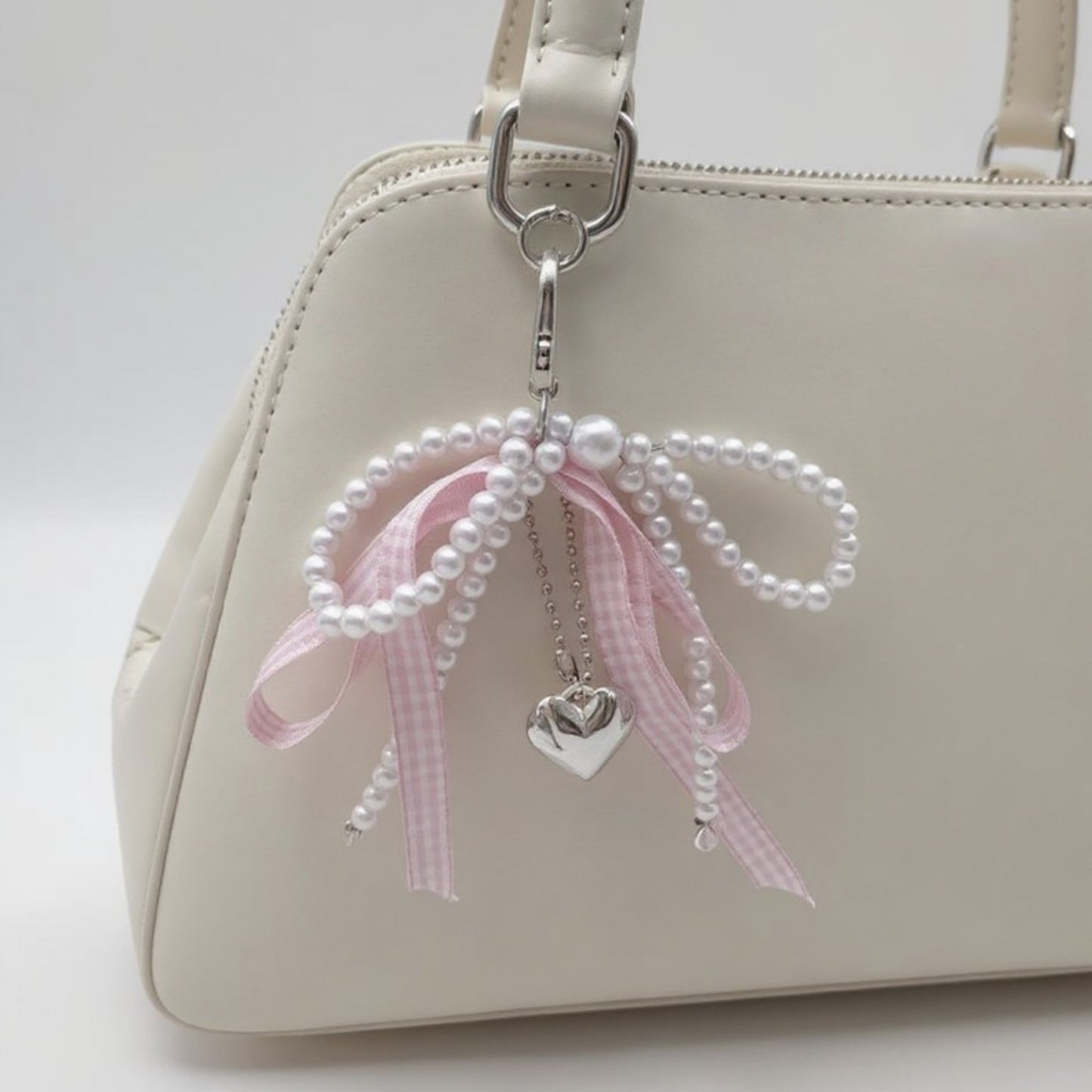 Anna-Kaci Ribbon Pearl Bow Keychain with Silver Heart Charm and Gingham Accent