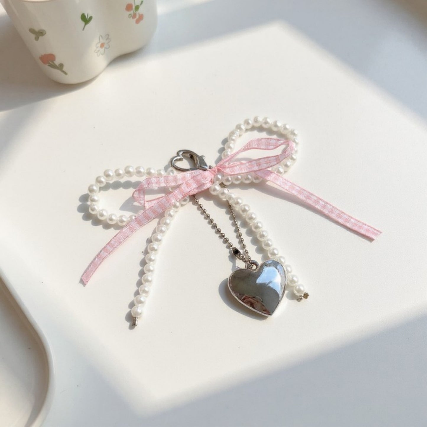 Anna-Kaci Ribbon Pearl Bow Keychain with Silver Heart Charm and Gingham Accent