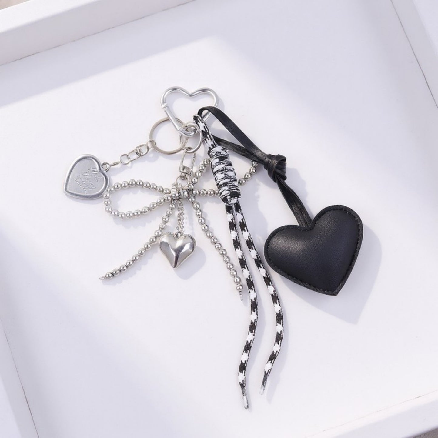 Anna-Kaci Heart Charm Keychain with Silver Chain Details and Bow Accent
