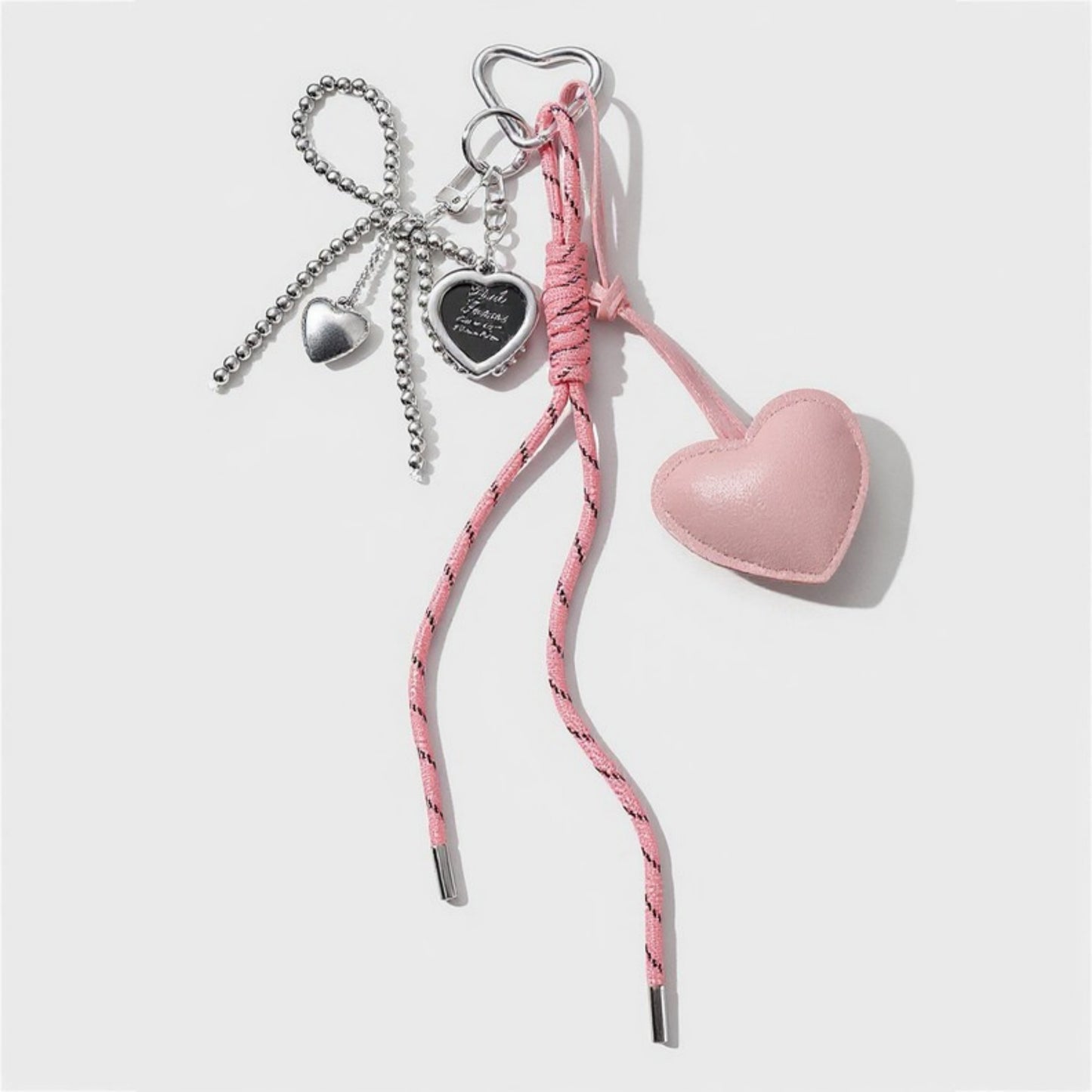 Anna-Kaci Heart Charm Keychain with Silver Chain Details and Bow Accent
