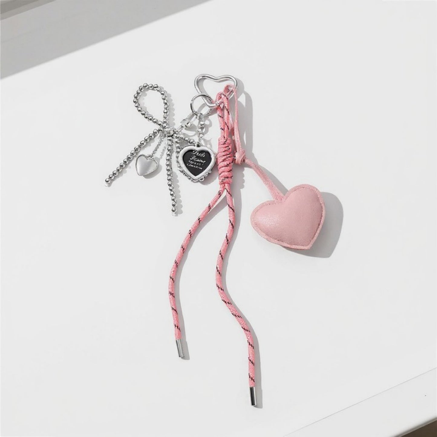 Anna-Kaci Heart Charm Keychain with Silver Chain Details and Bow Accent