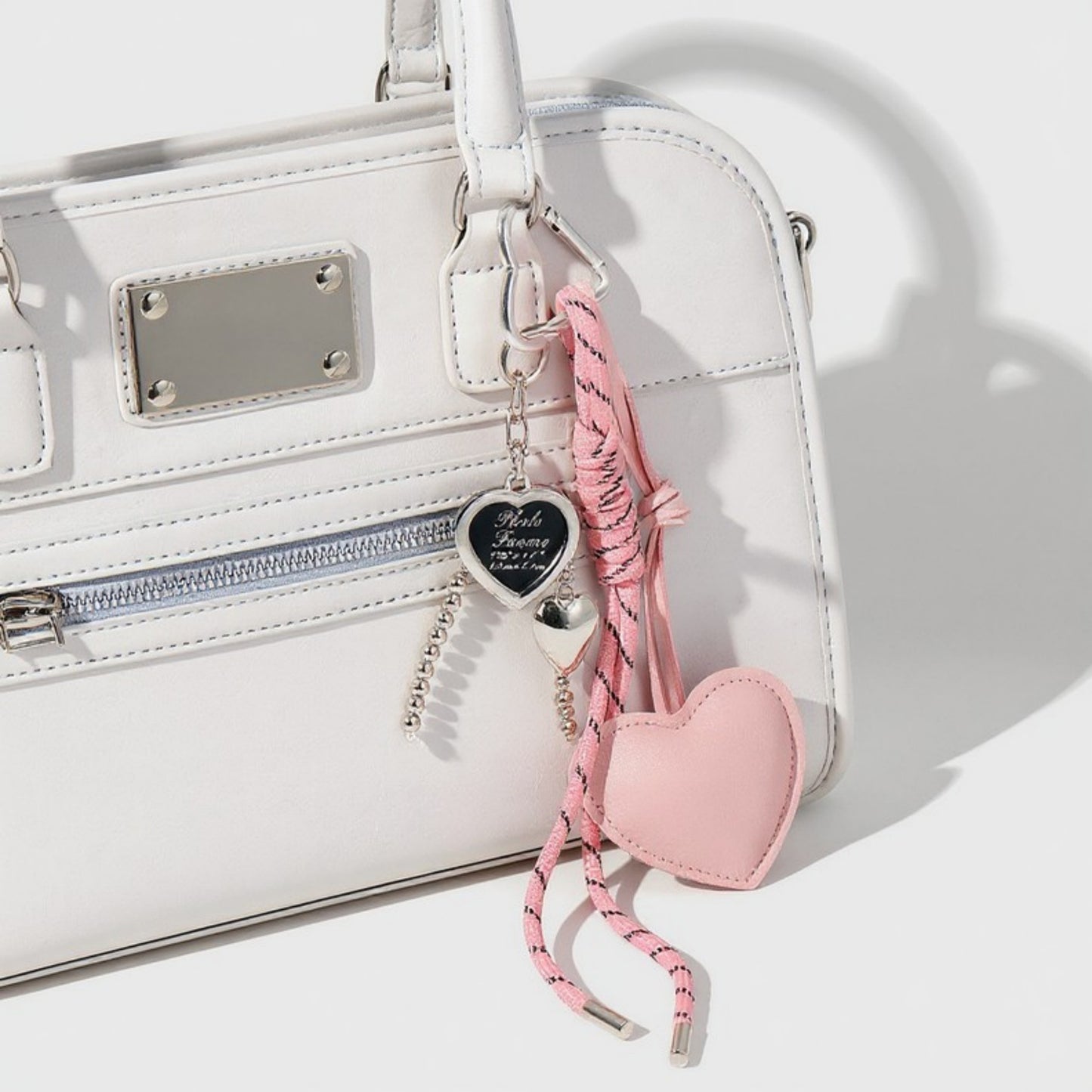 Anna-Kaci Heart Charm Keychain with Silver Chain Details and Bow Accent