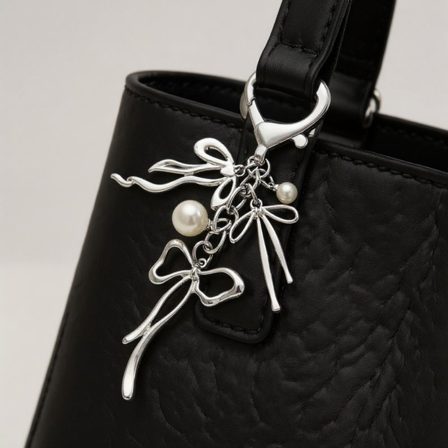 Anna-Kaci Silver Bow Keychain with Pearl Charms and Heart Clasp Accent