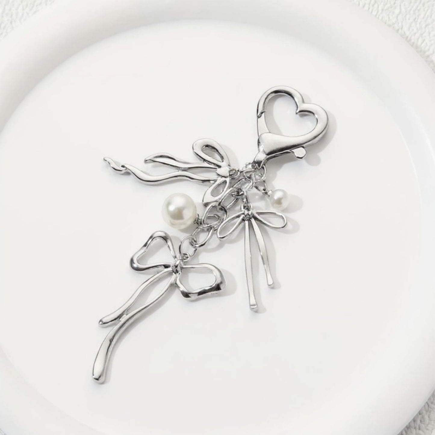 Anna-Kaci Silver Bow Keychain with Pearl Charms and Heart Clasp Accent