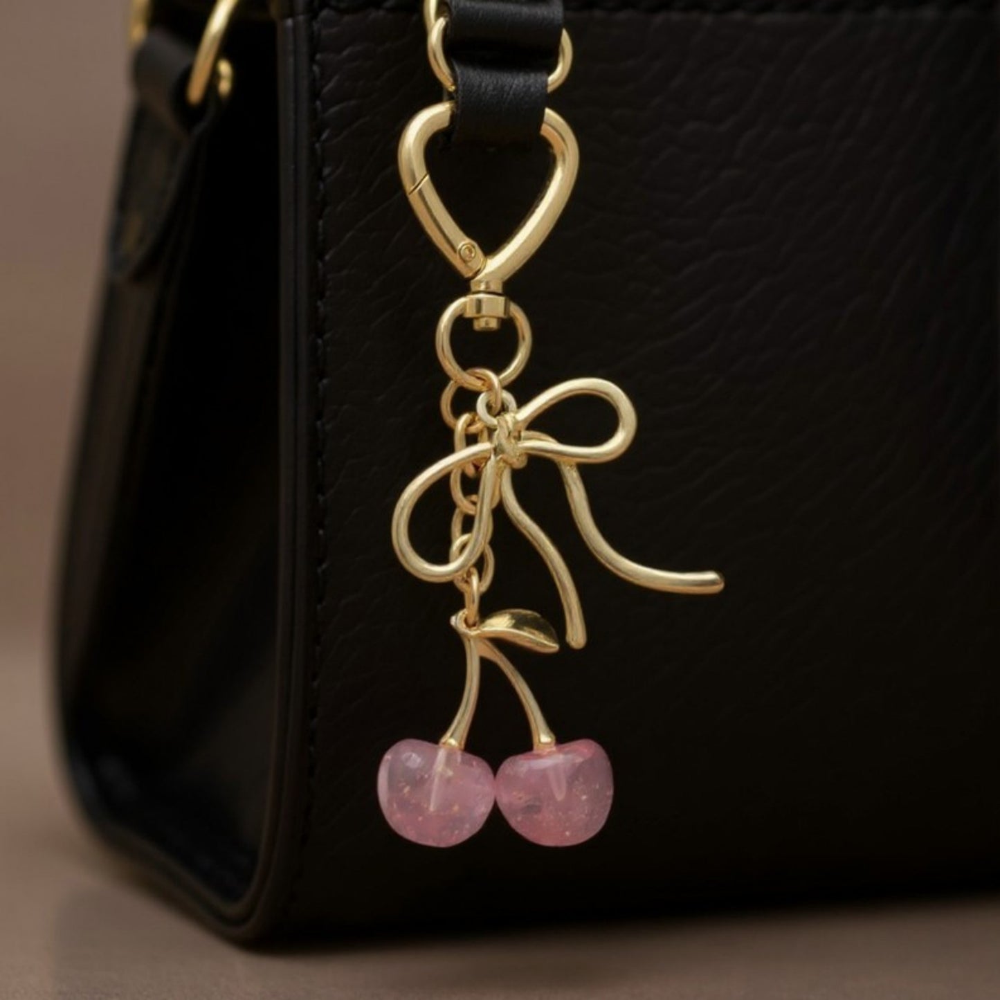 Anna-Kaci Gold Bow Keychain with Pink Cherry Charms and Heart Clasp