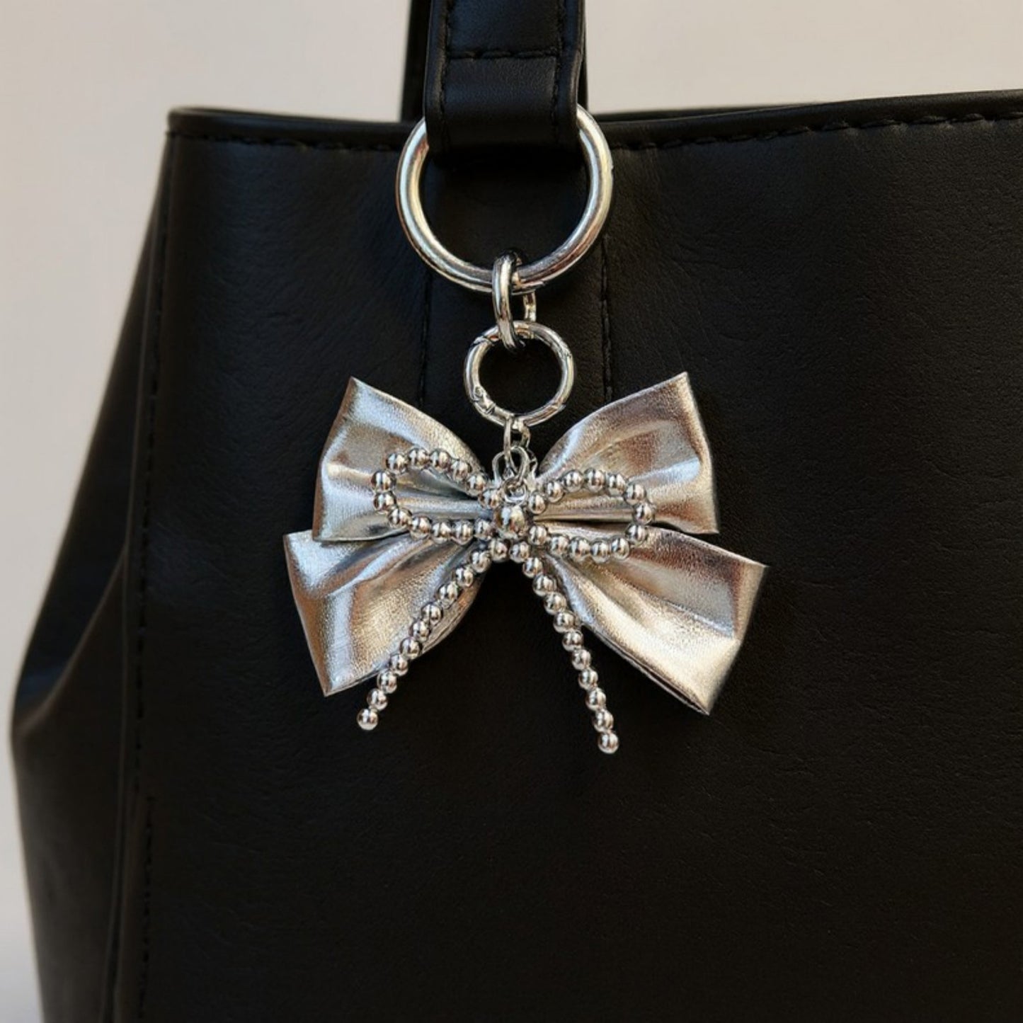Anna-Kaci Metallic Bow Charm Keychain with Silver Beaded Detailing