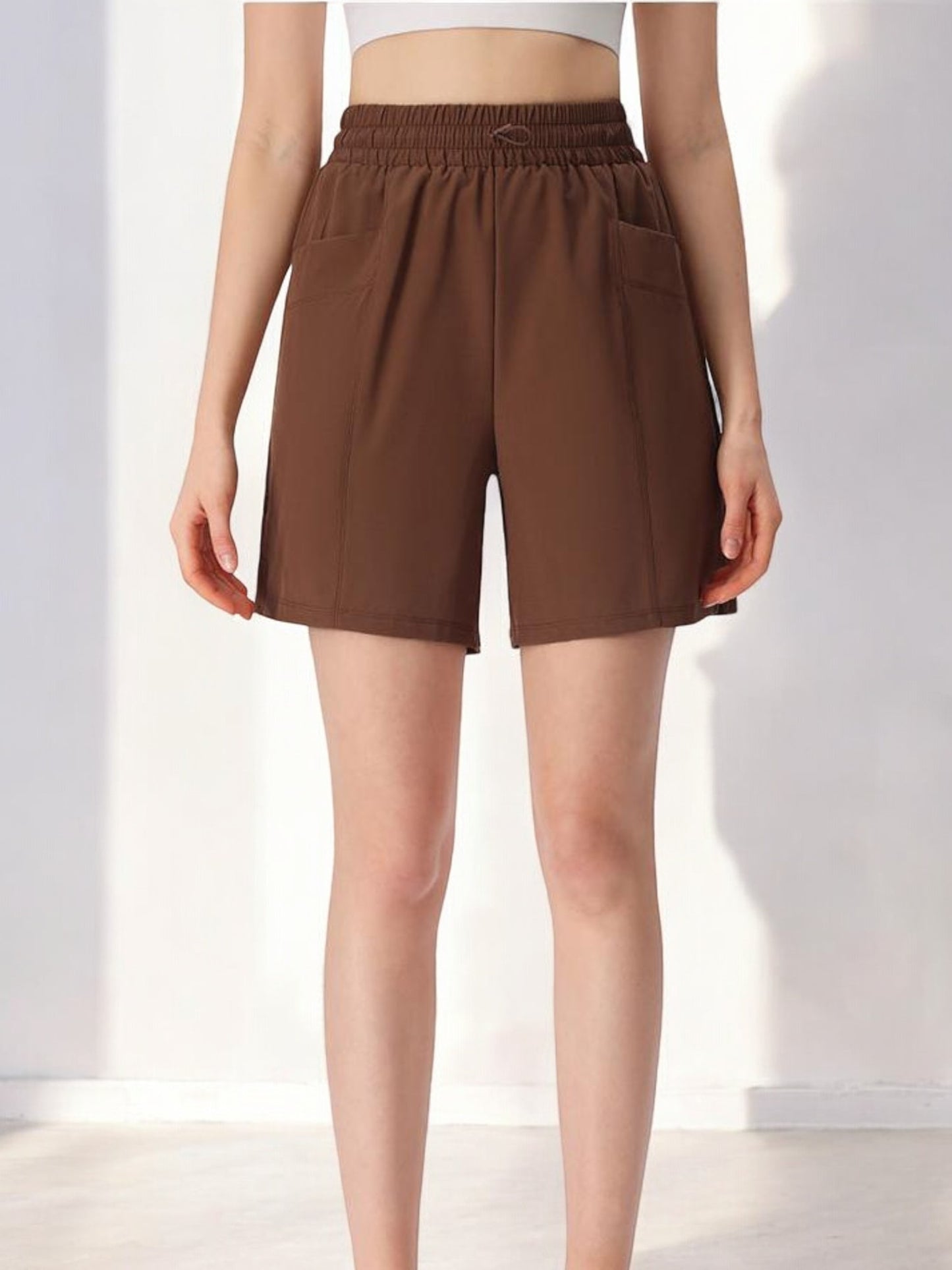 High Waist Drawstring Athletic Shorts with Relaxed Fit and Side Pockets