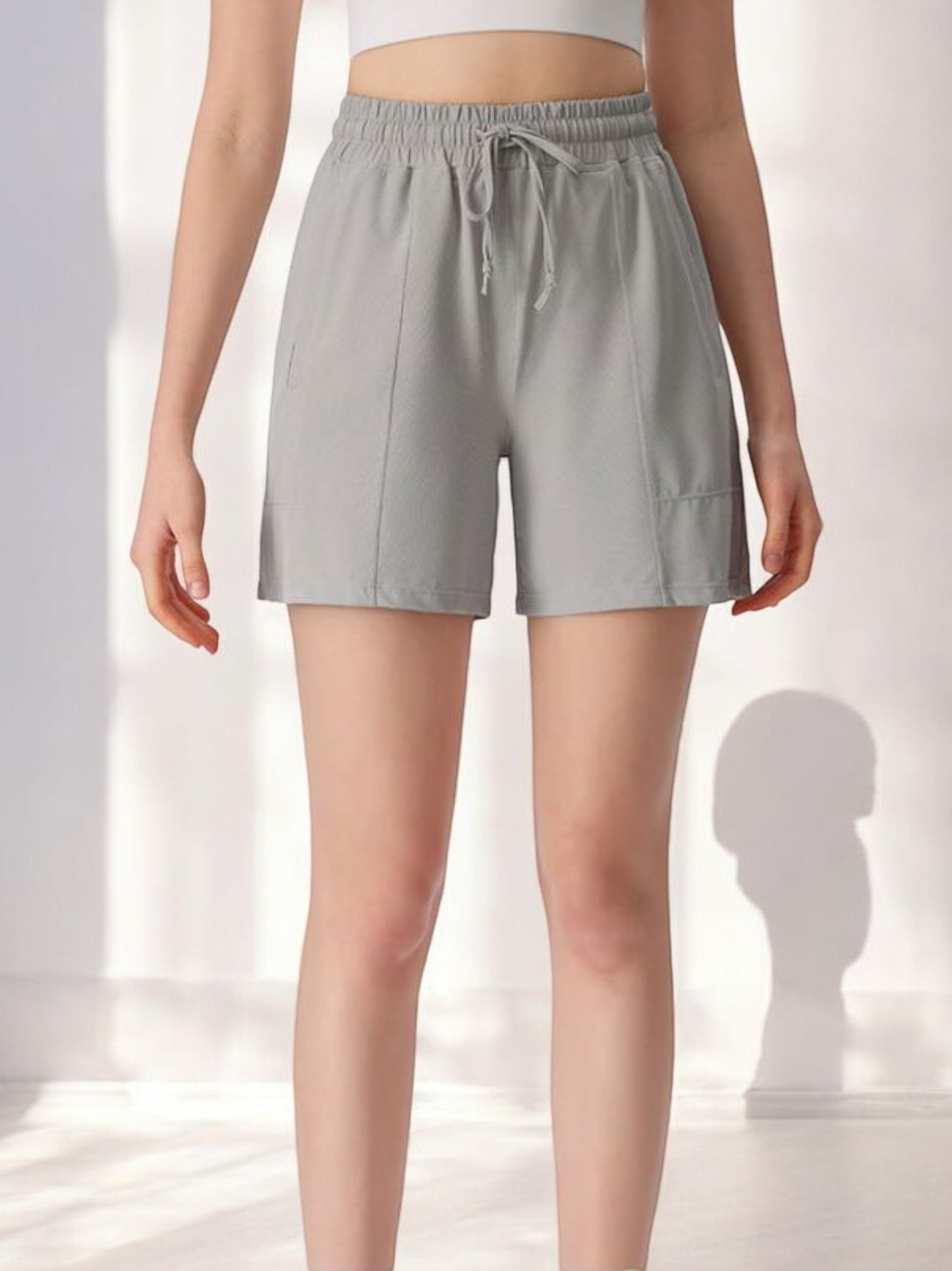 High Waist Drawstring Athletic Shorts with Relaxed Fit and Side Pockets