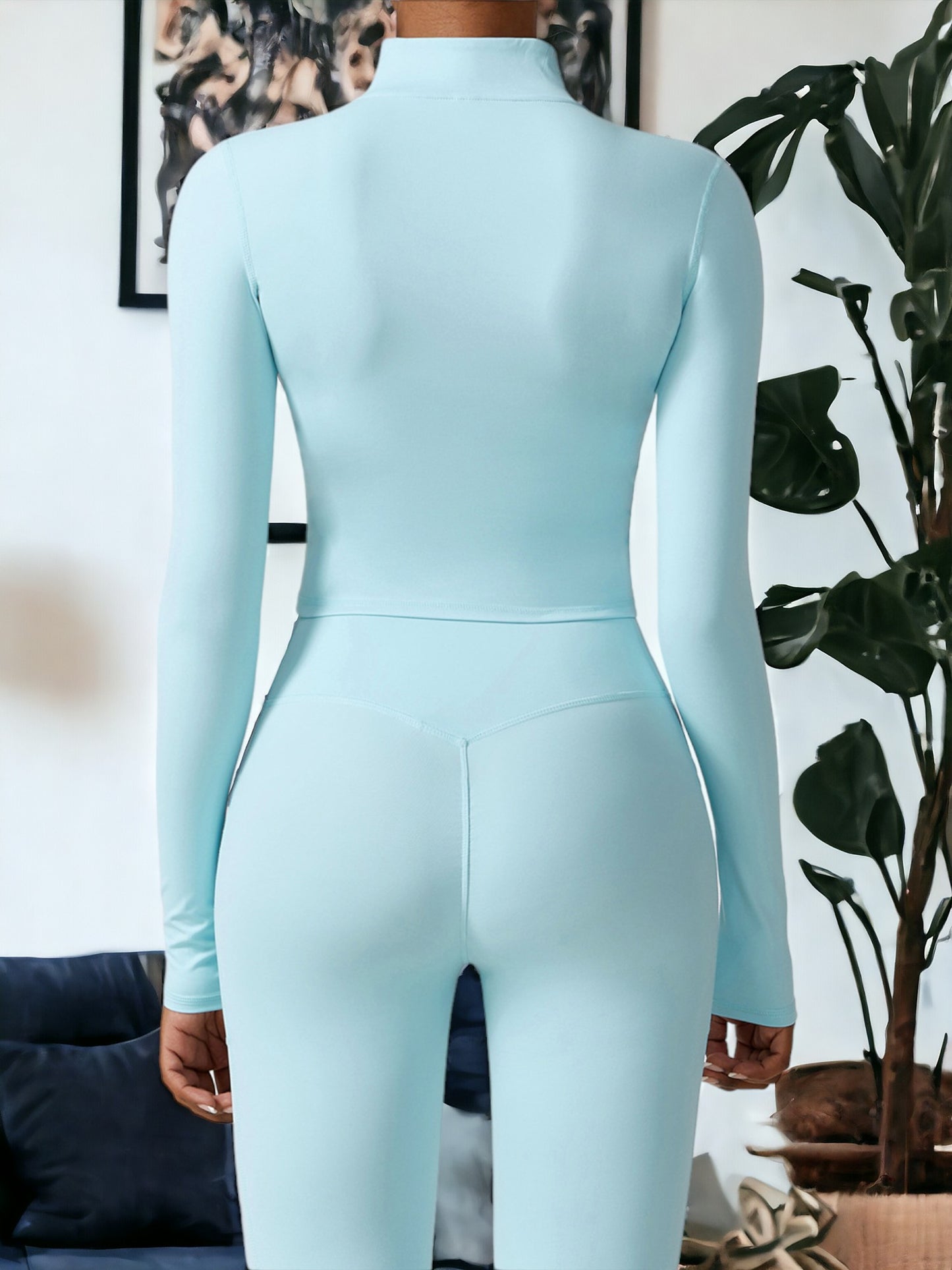 Chaqueta deportiva ajustada de secado rápido con cremallera frontal y mangas largas