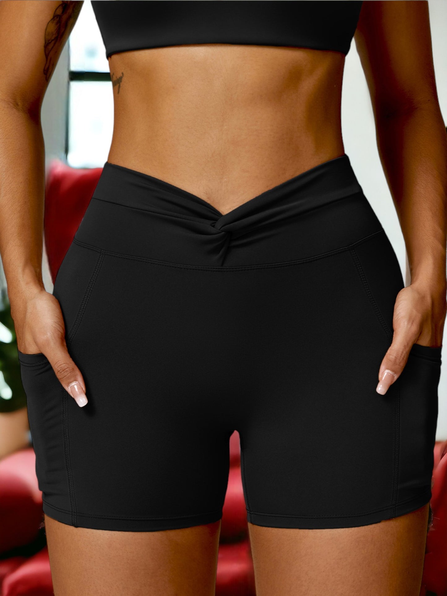 Pantalones cortos ajustados de fitness para mujer que realzan los glúteos