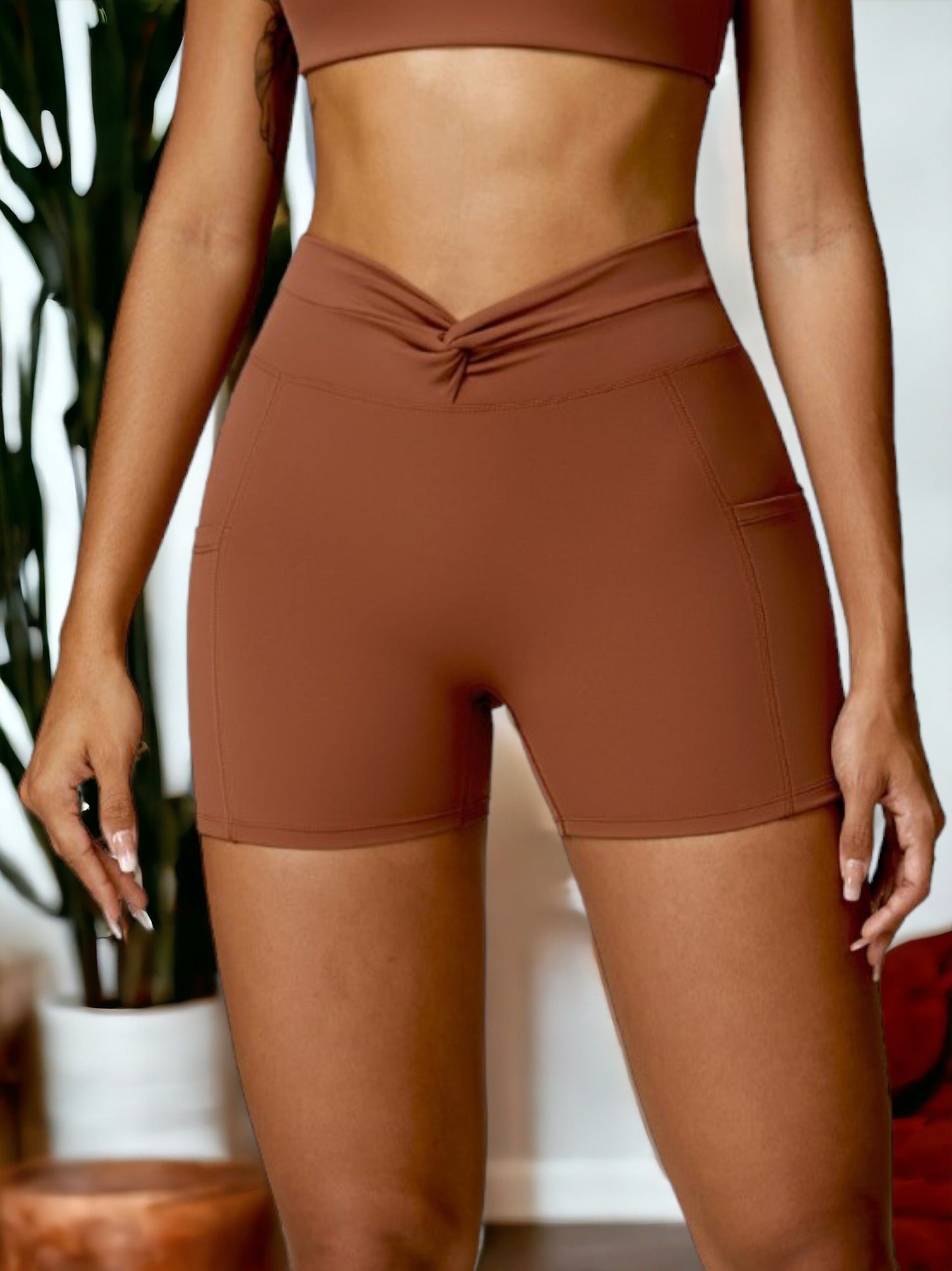Pantalones cortos ajustados de fitness para mujer que realzan los glúteos
