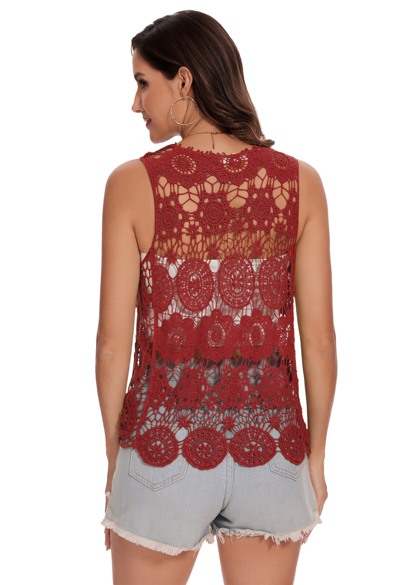 Chaleco abierto al frente con diseño floral de crochet