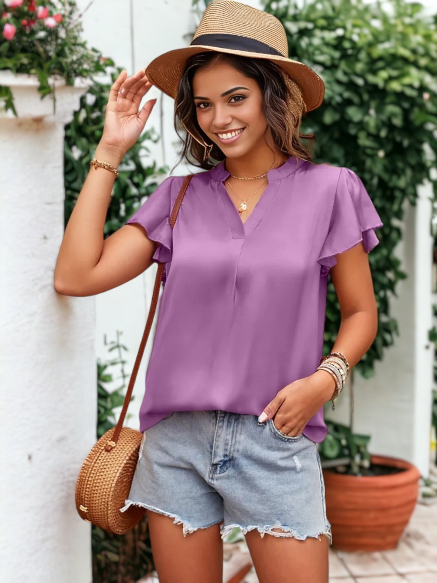 Blusa de satén con mangas onduladas