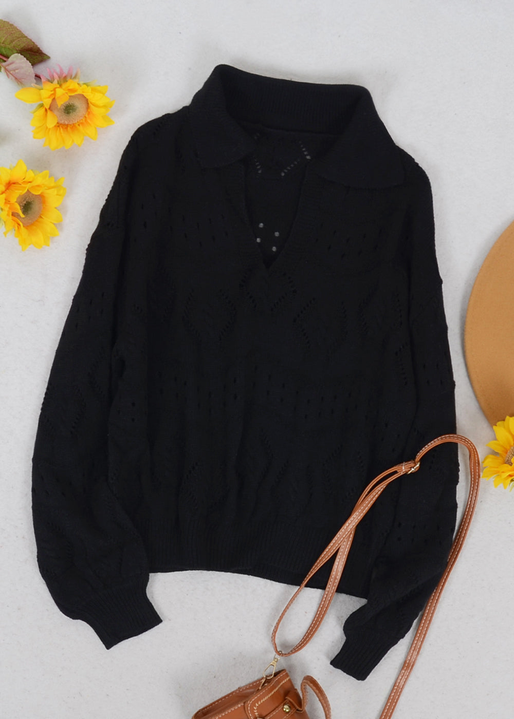 Suéter de punto con ojales en color liso