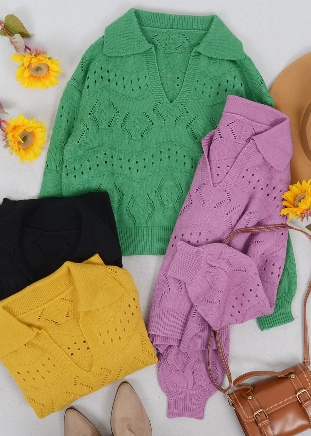 Suéter de punto con ojales en color liso