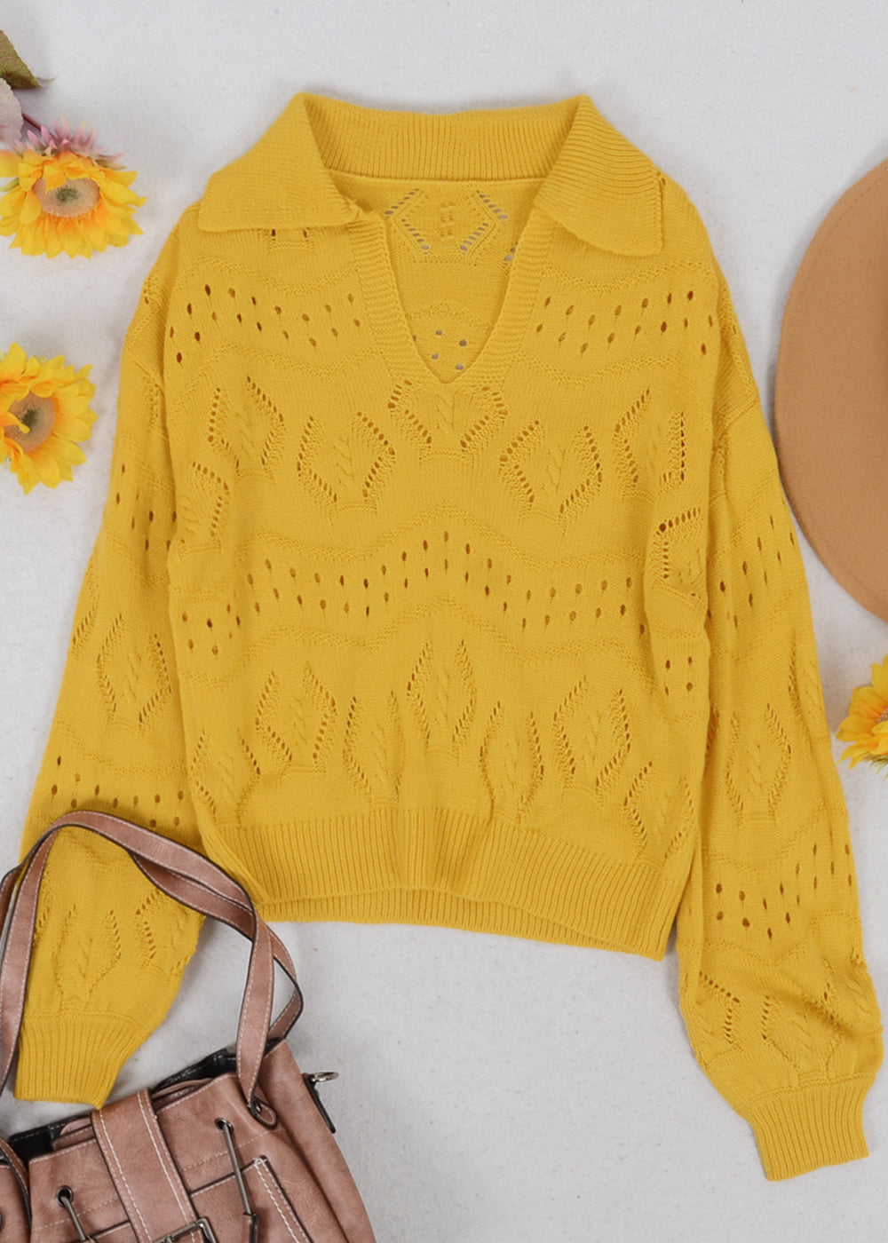 Suéter de punto con ojales en color liso