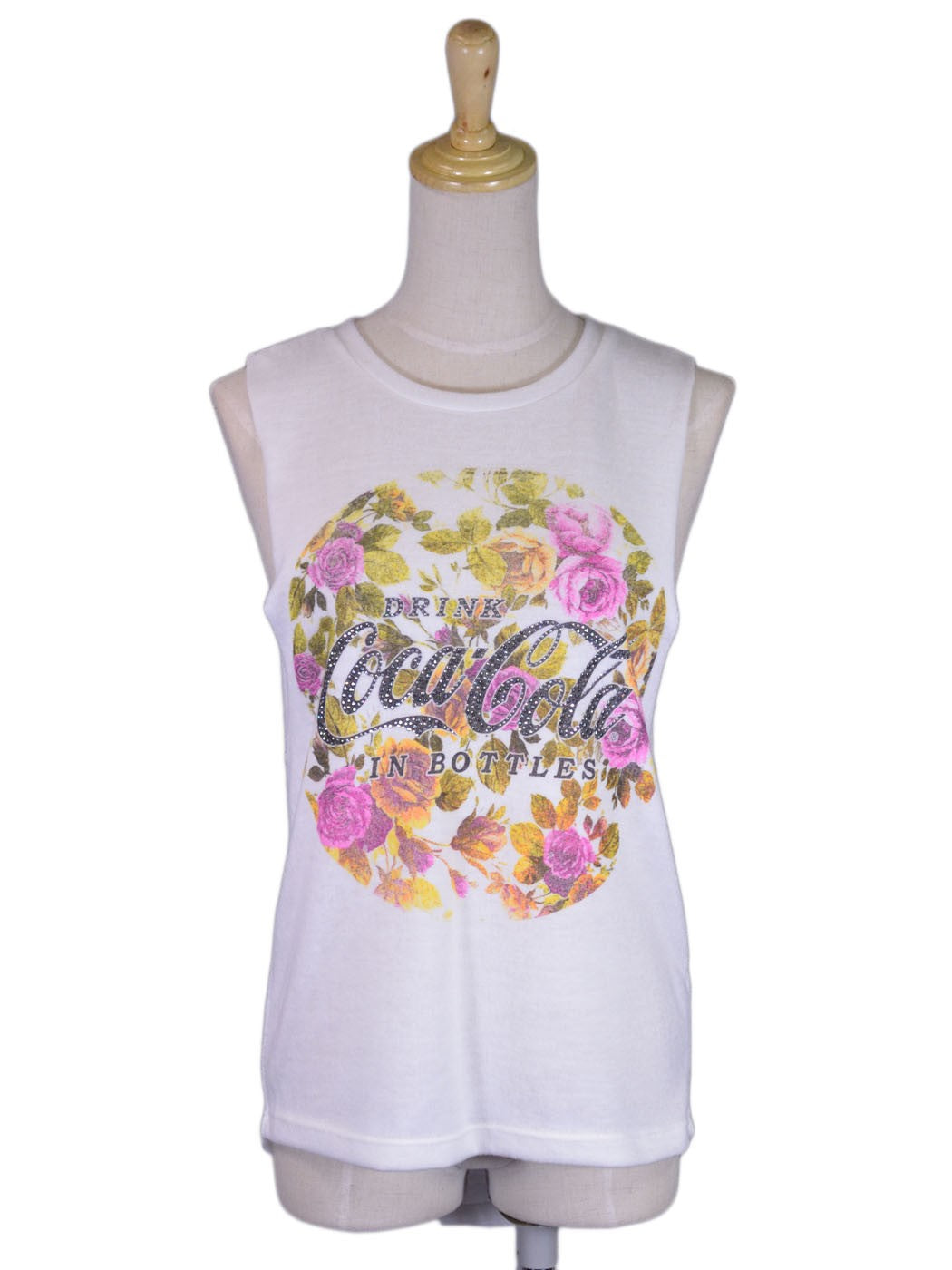 Top de punto sin mangas con cuello redondo y logo de Coca-Cola con estampado floral clásico e informal Sunset