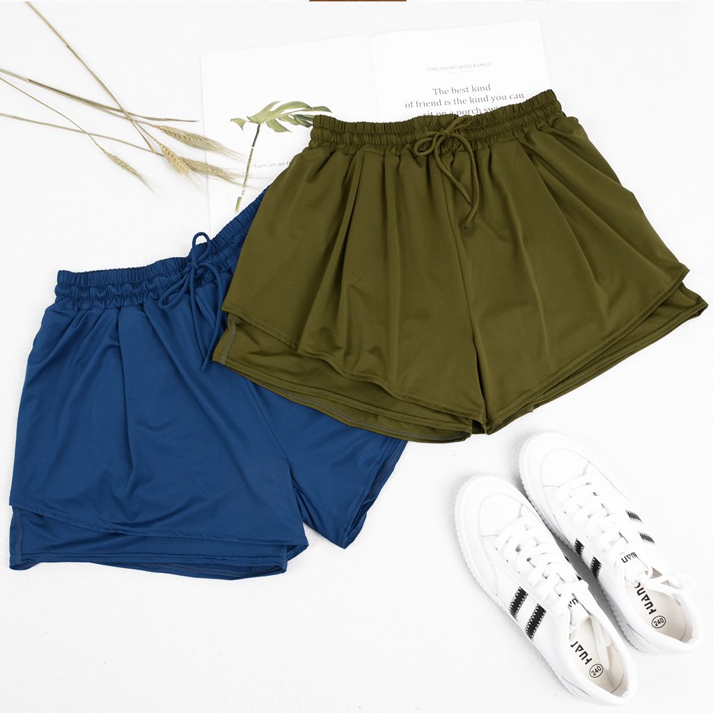 Pantalones cortos de fitness con tejido suelto y transpirable