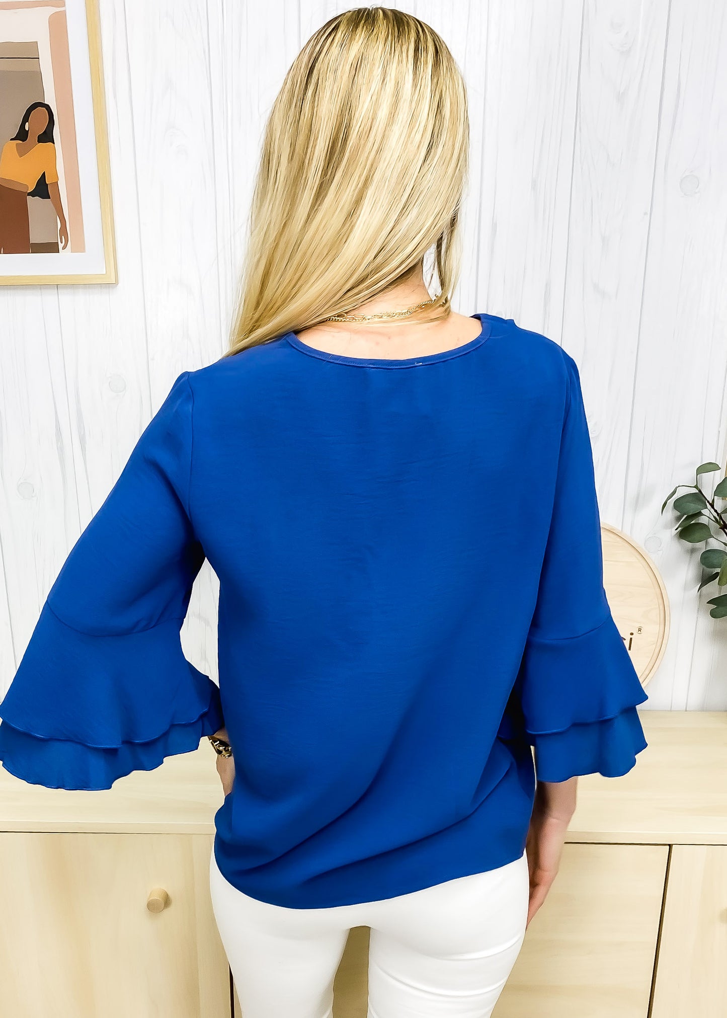 Blusa con mangas con volantes en capas