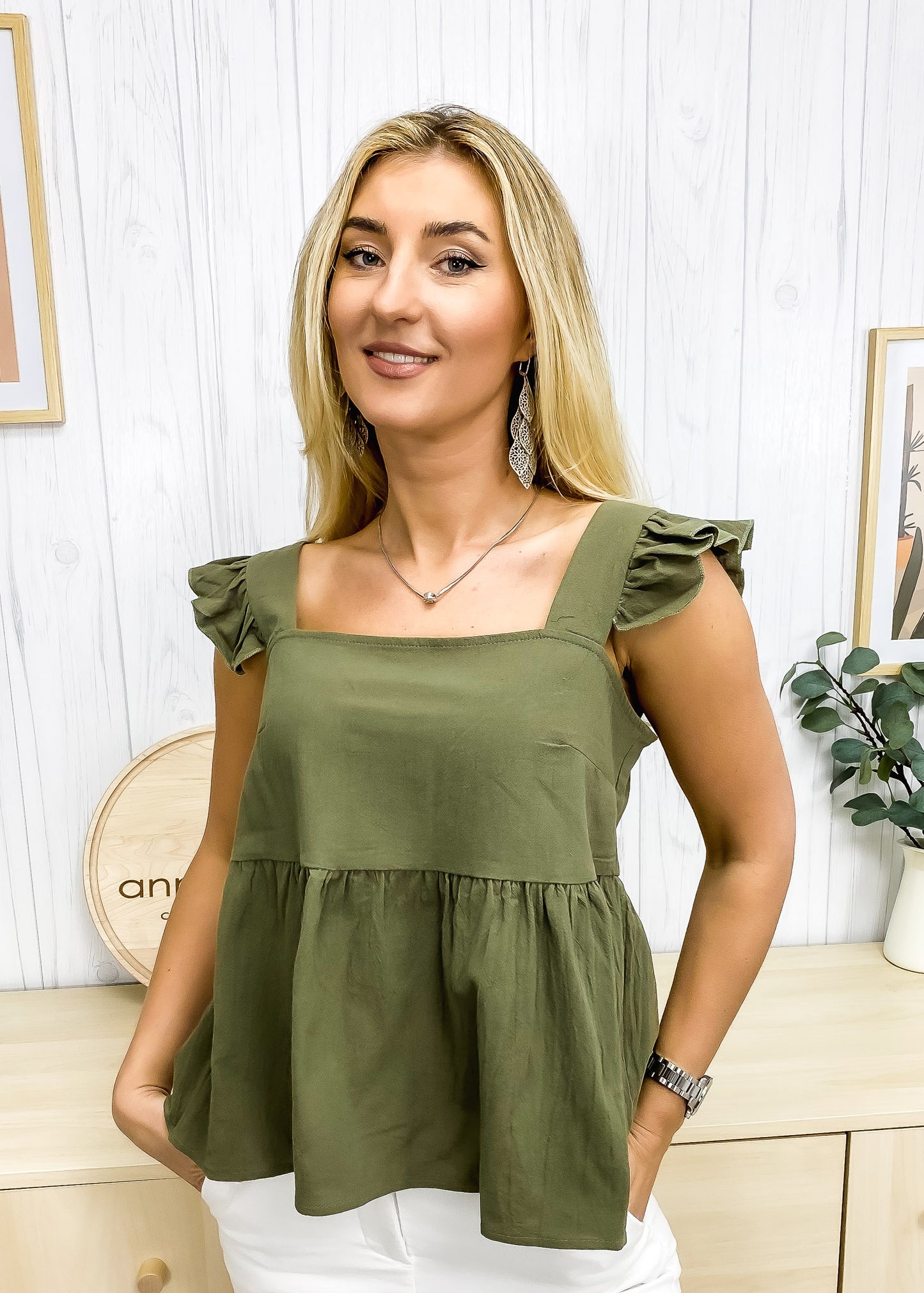 Blusa ligera con peplum y volantes
