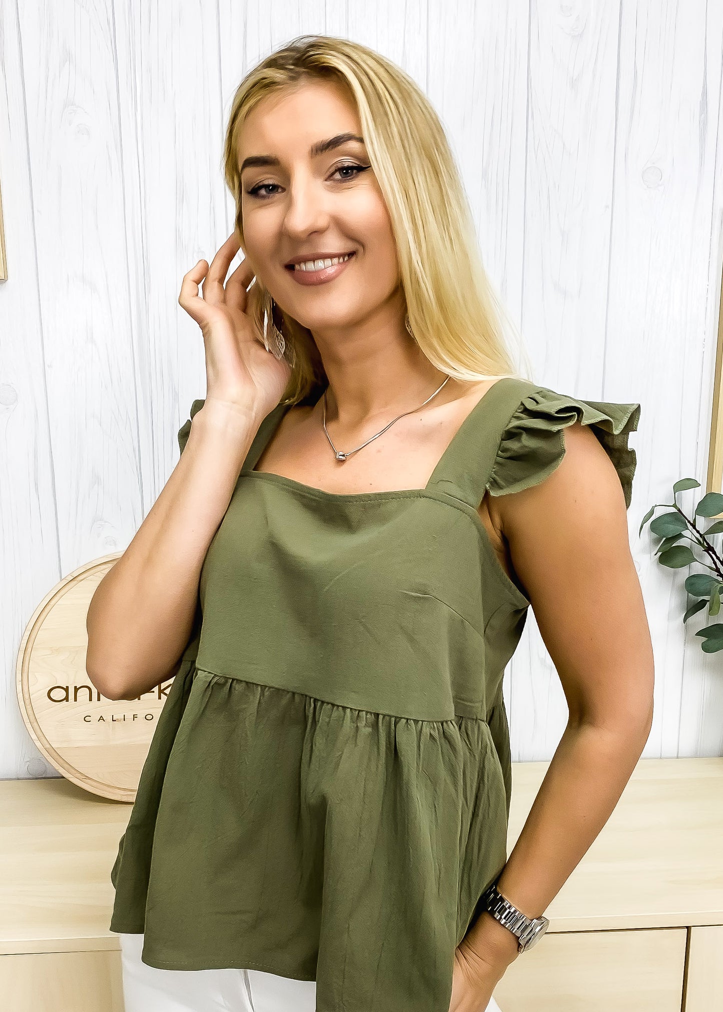 Blusa ligera con peplum y volantes