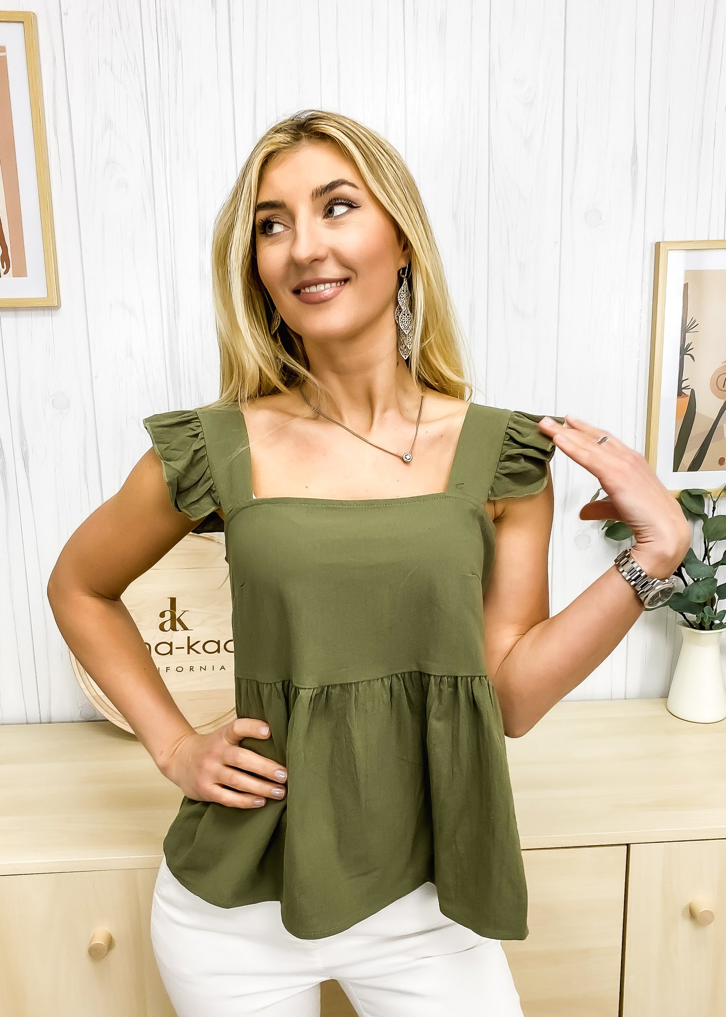 Blusa ligera con peplum y volantes