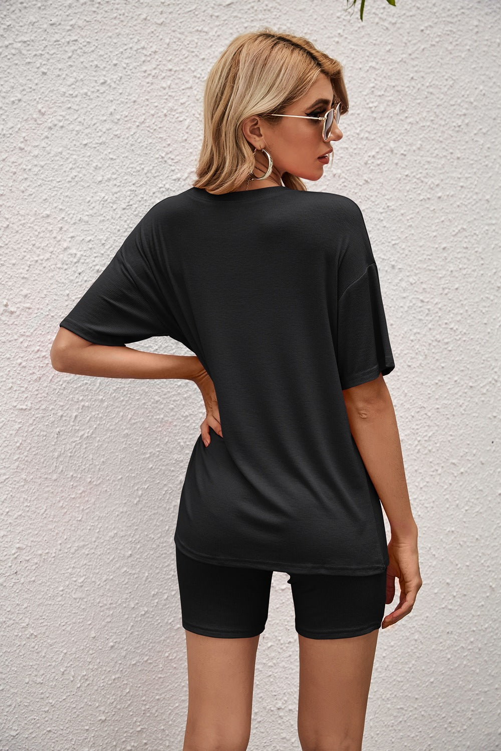 Conjunto de camiseta y pantalones cortos de ciclista de color liso