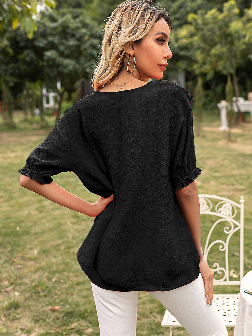 Blusa túnica con vuelo y escote en V