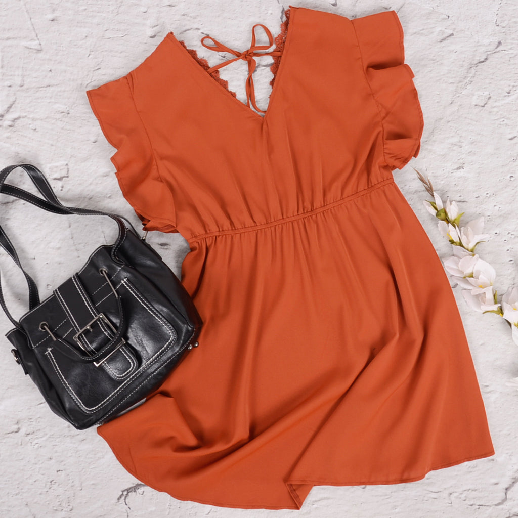 Vestido liso con escote en V y espalda anudada