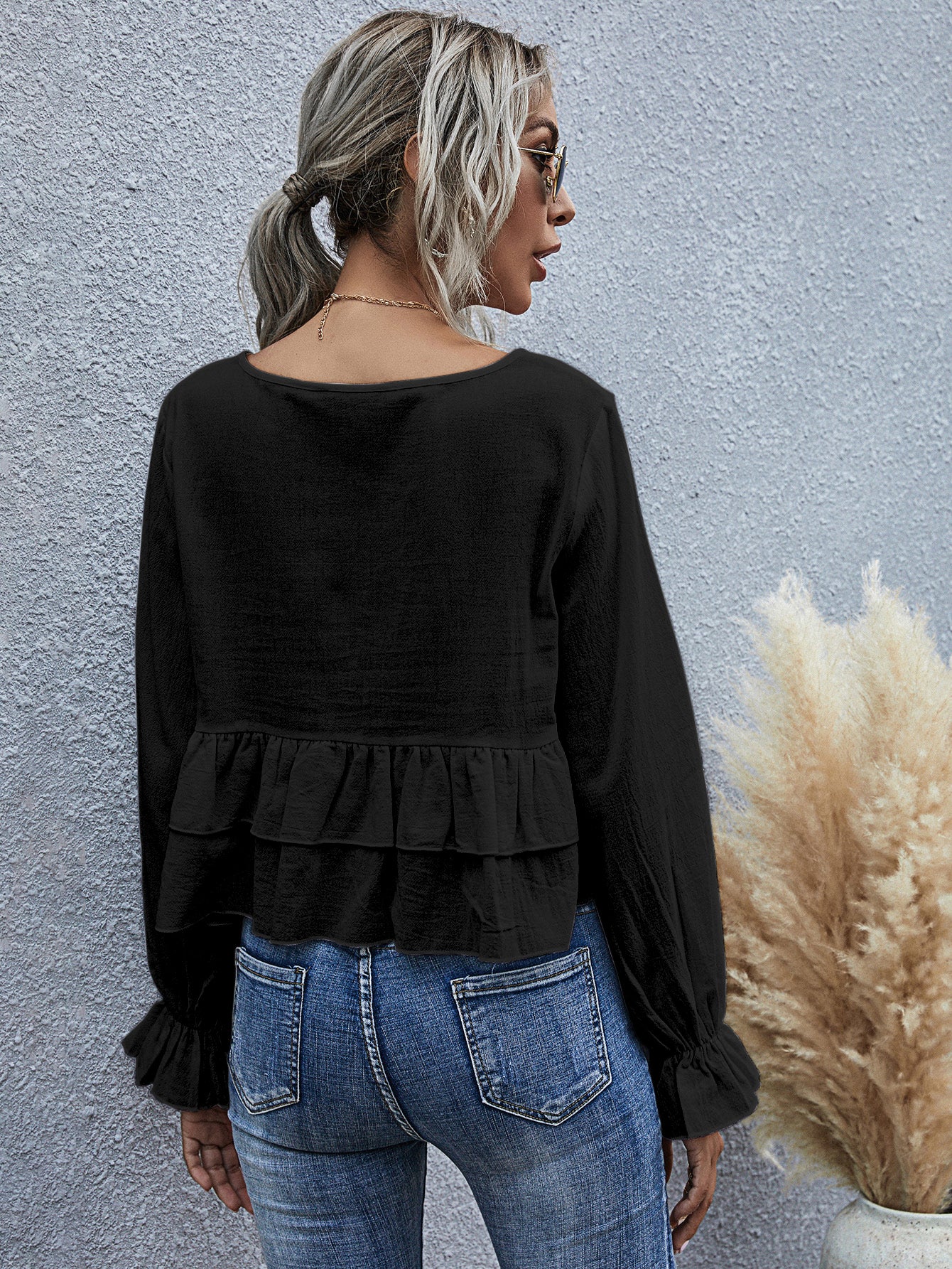 Blusa de manga larga semicorta con volantes