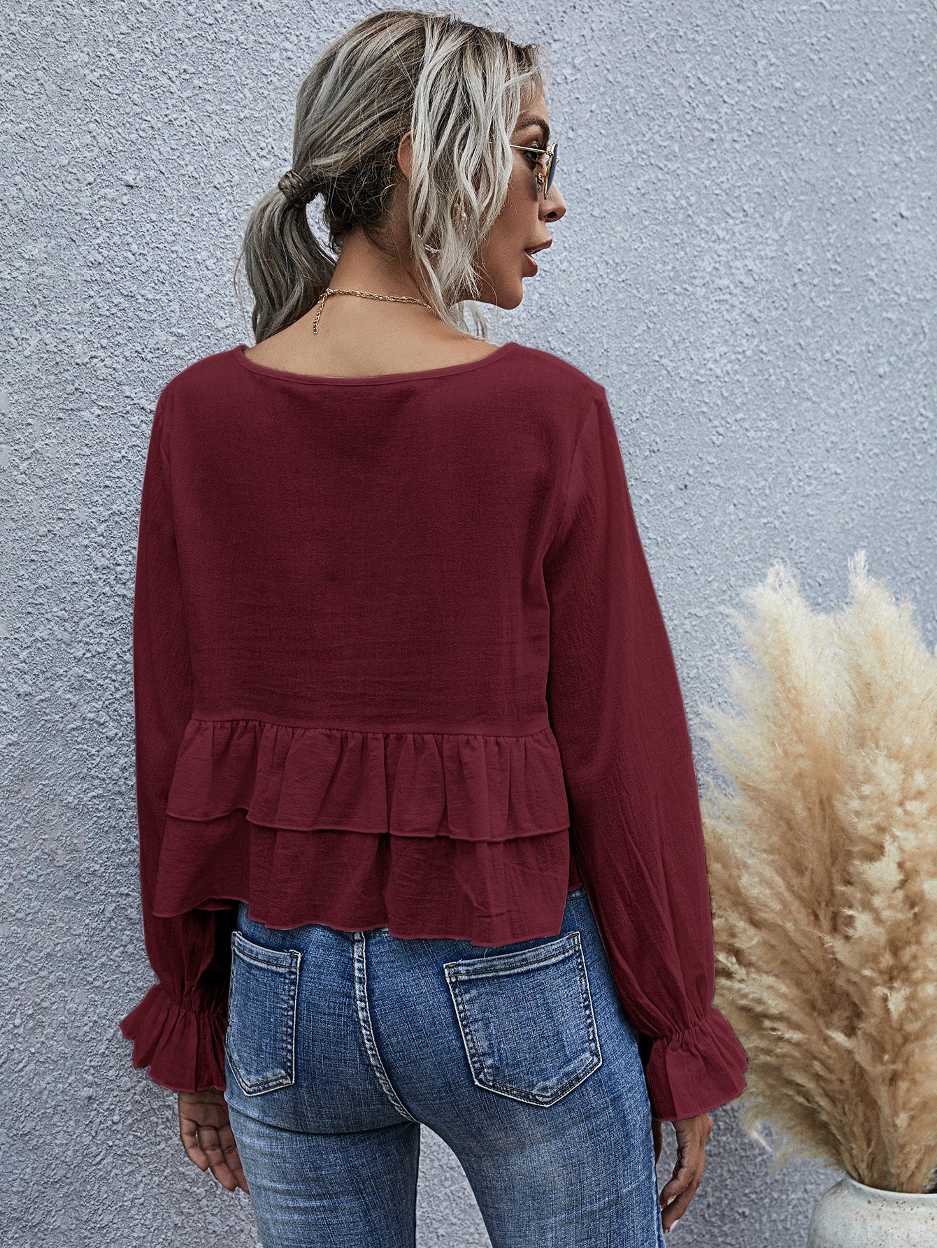 Blusa de manga larga semicorta con volantes