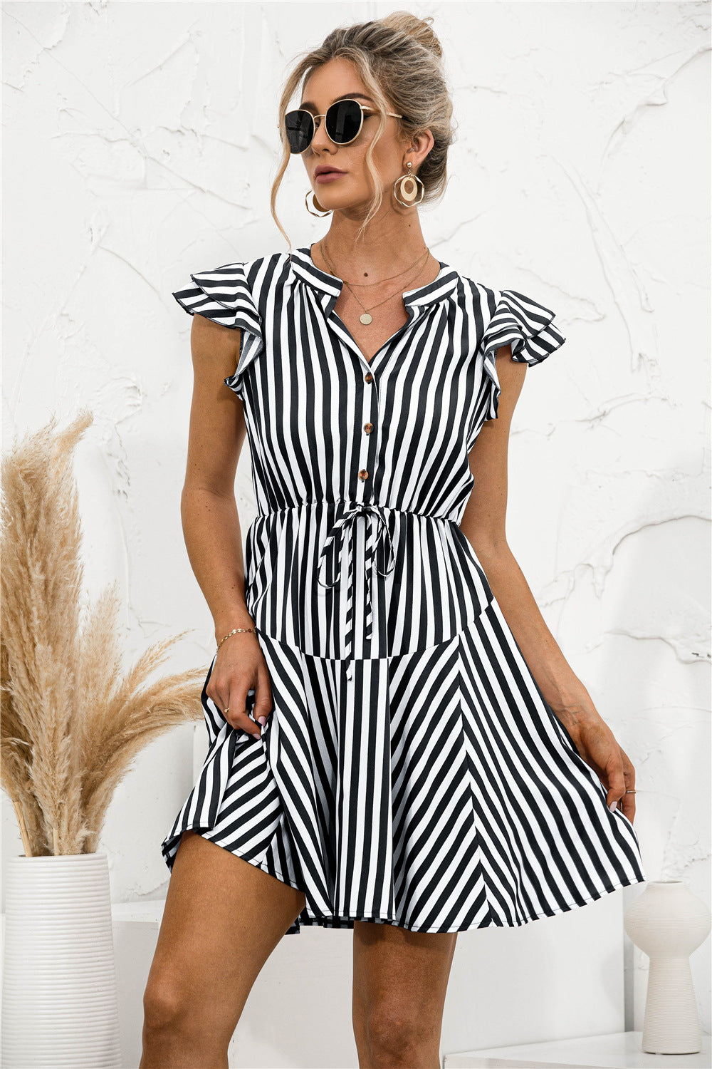 Vestido mini túnica con volantes y rayas