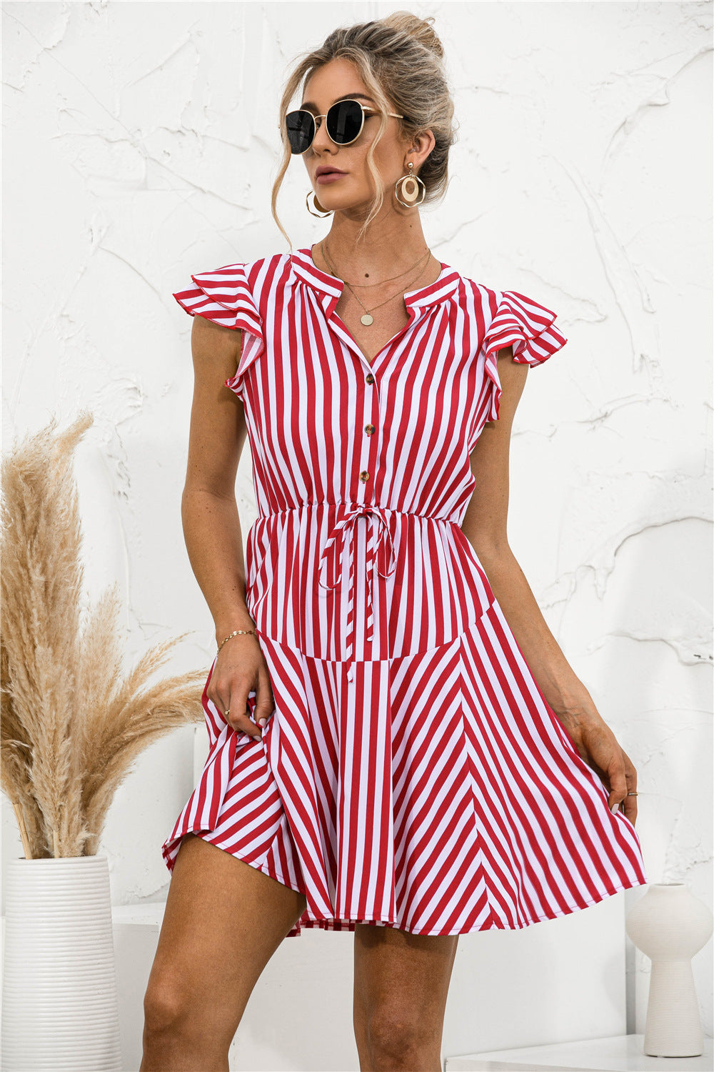 Vestido mini túnica con volantes y rayas