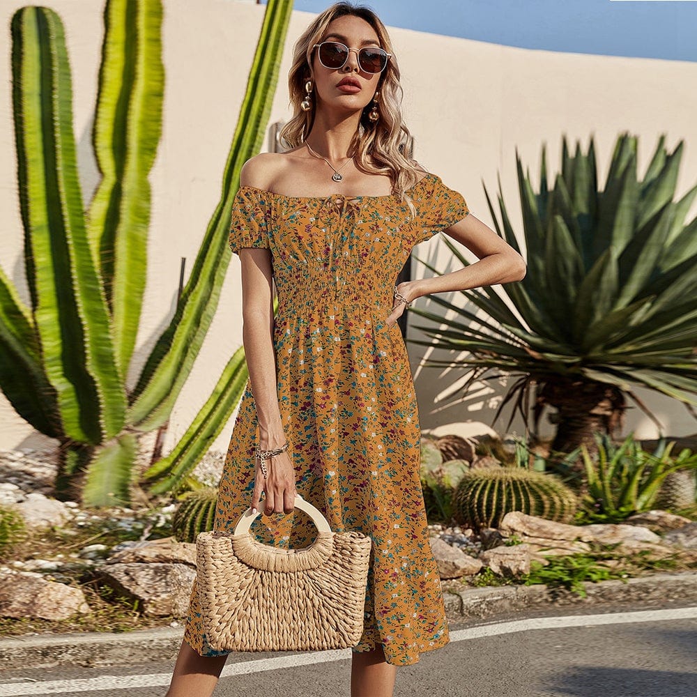 Vestido con estampado de margaritas y cintura fruncida