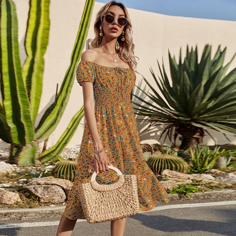 Vestido con estampado de margaritas y cintura fruncida