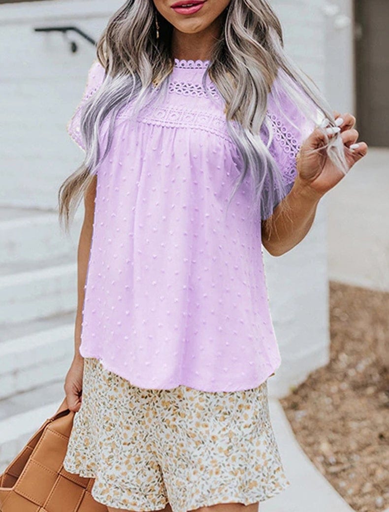 Blusa con botones en la espalda y lunares suizos