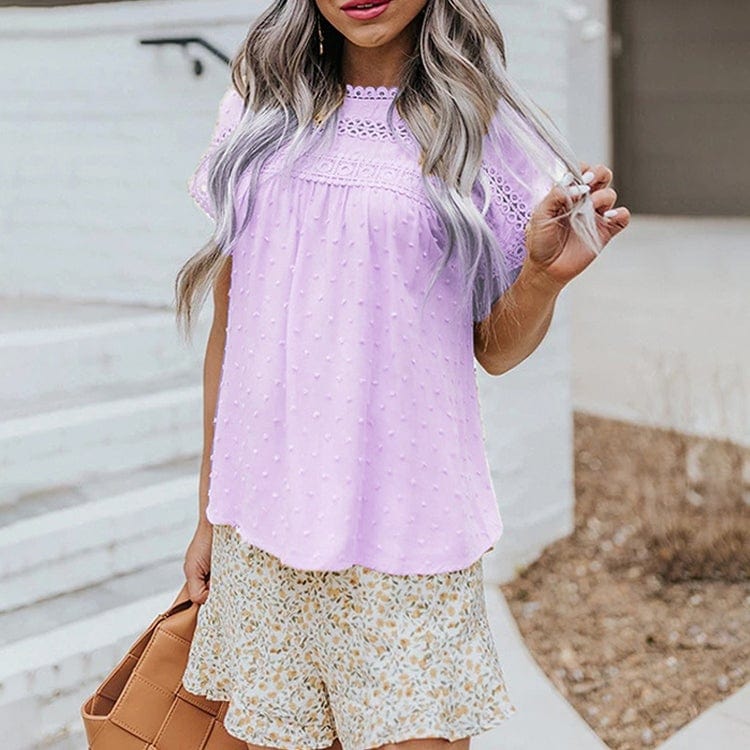 Blusa con botones en la espalda y lunares suizos