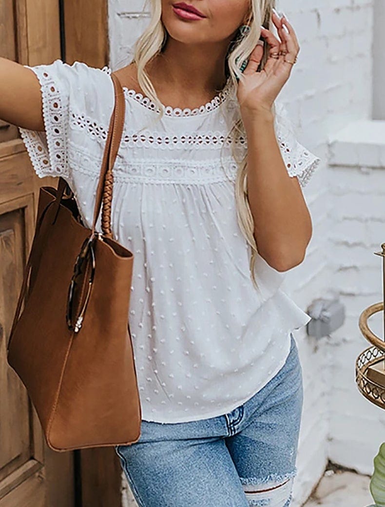 Blusa con botones en la espalda y lunares suizos