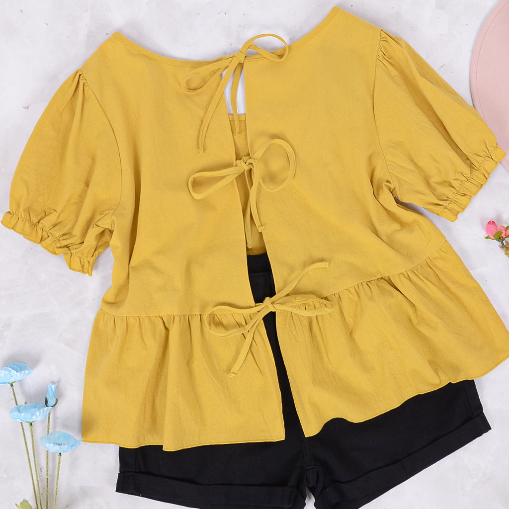 Blusa con lazo en la espalda y mangas abullonadas