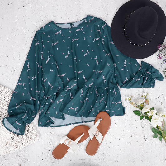 Blusa de manga larga con volantes y estampado floral