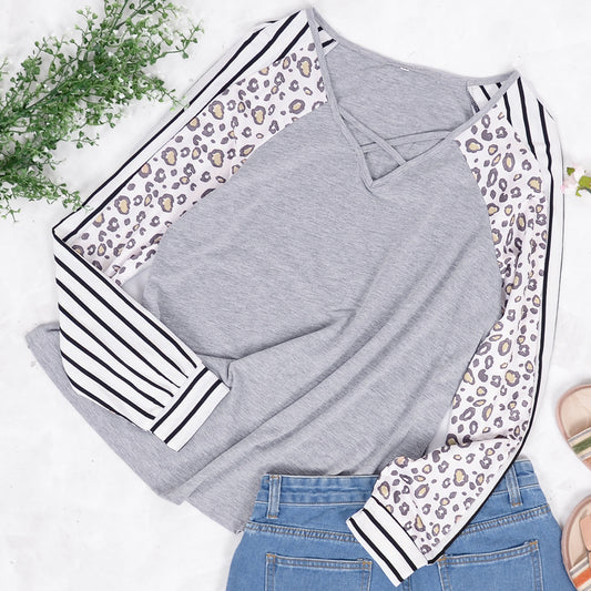 Blusa de manga larga con estampado de leopardo a rayas