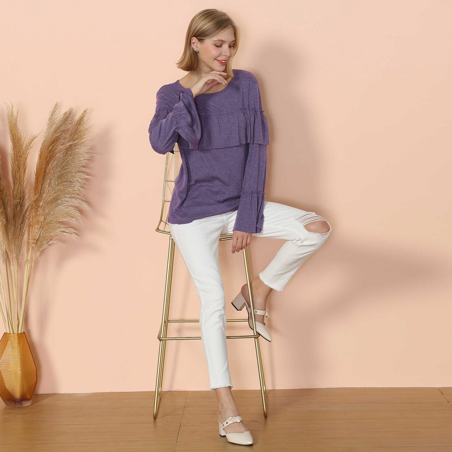 Blusa de manga larga con volantes en el pecho