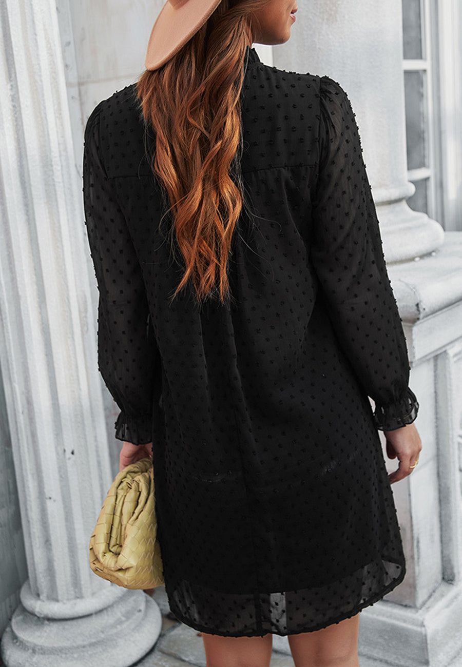 Vestido de lunares suizos con cuello con volantes