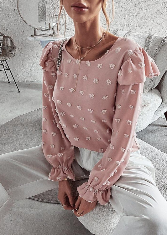 Blusa con hombros con volantes y lunares suizos